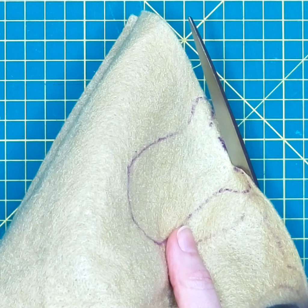 image showing the traced face and back of head being cut out